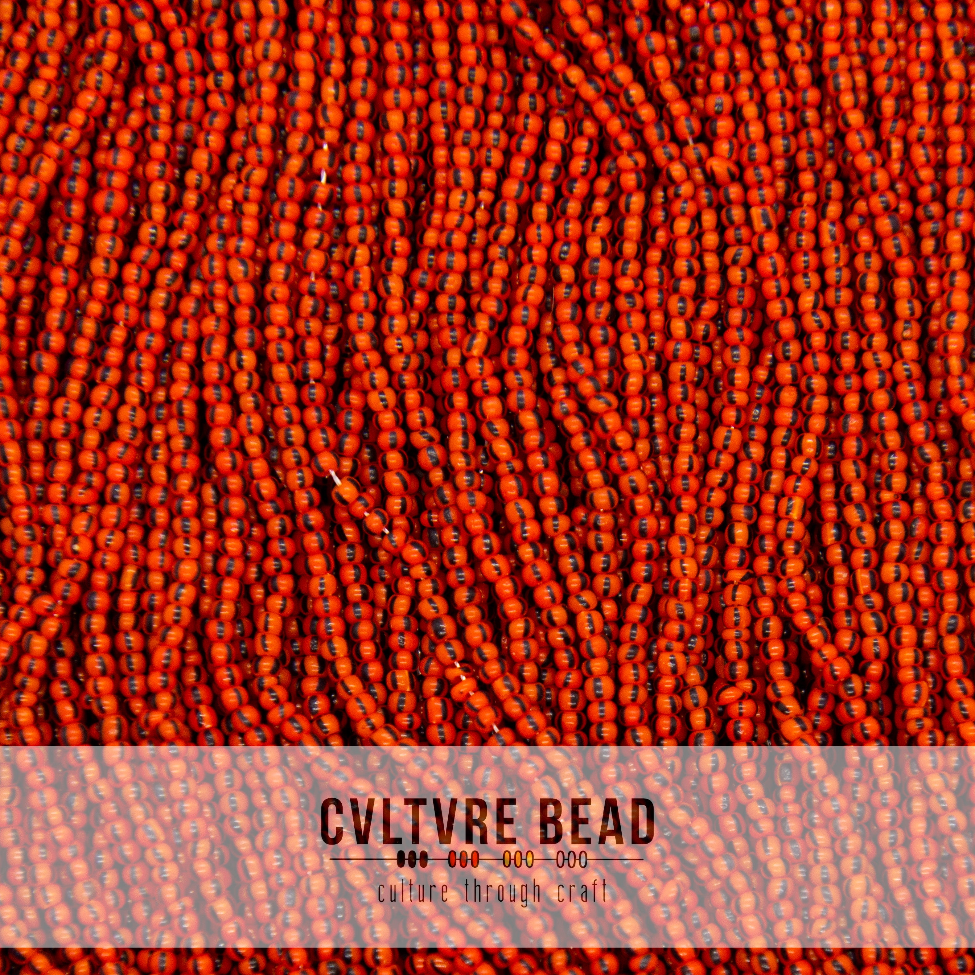 Czech Seed Bead 12/0 - Red Orange/Black Striped - 1 Hank
